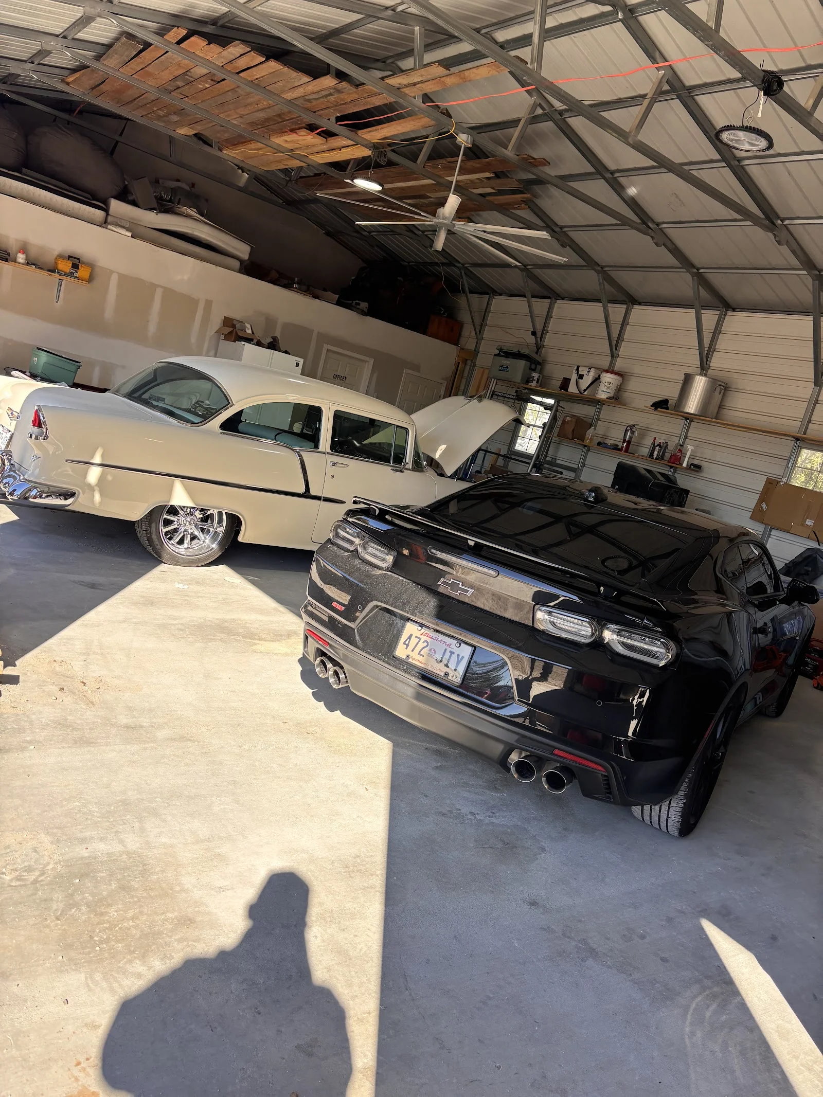 Vehicles serviced inside the Plaisance Auto LLC shop in Morgan City, LA